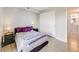 Bedroom featuring a comfortable bed, and spacious closet at 2575 S Syracuse Way # K201, Denver, CO 80231