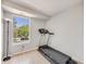 Spacious exercise room with large window and treadmill at 2575 S Syracuse Way # K201, Denver, CO 80231