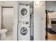 Laundry room with stacked washer and dryer unit at 2575 S Syracuse Way # K201, Denver, CO 80231