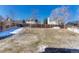 Large fenced backyard with potential for landscaping and outdoor activities in a residential neighborhood at 20011 E Bellewood Dr, Centennial, CO 80015