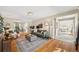 Spacious living room with hardwood floors, fireplace, and an open layout at 6839 S Niagara Ct, Centennial, CO 80112