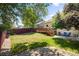 A nice backyard with a deck, grass and gravel offers plenty of room at 6318 Newton Ct, Arvada, CO 80003