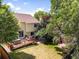 A nice aerial shot of a backyard with a deck, grass and patio area at 6318 Newton Ct, Arvada, CO 80003