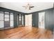 Spacious bedroom featuring custom closet system and ensuite bathroom at 6318 Newton Ct, Arvada, CO 80003