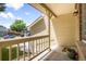 Cozy covered front porch perfect for enjoying the outdoors in a quiet residential neighborhood at 6318 Newton Ct, Arvada, CO 80003