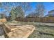 Well-maintained backyard with grass, privacy fence and wood deck at 13322 Marion St, Thornton, CO 80241