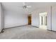 Bright bedroom with neutral carpet and ensuite/closet access at 13322 Marion St, Thornton, CO 80241