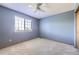 Bedroom with carpet flooring and a window with natural light at 13322 Marion St, Thornton, CO 80241