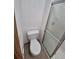 This bathroom features a toilet and glass enclosed shower at 2239 S Truckee St, Aurora, CO 80013