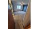 Large carpeted bedroom featuring a ceiling fan and window at 2239 S Truckee St, Aurora, CO 80013