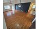 Spacious living room with hardwood floors and large windows at 2239 S Truckee St, Aurora, CO 80013