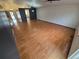 Open living room with hardwood floors and neutral color scheme at 2239 S Truckee St, Aurora, CO 80013