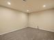A finished basement features neutral carpet and recessed lighting at 10730 Hillrose St, Parker, CO 80134