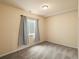 Bedroom with a window, carpet, and neutral walls at 10730 Hillrose St, Parker, CO 80134