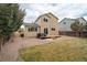 Spacious backyard with a deck and well-maintained lawn at 4485 E Andover Ave, Castle Rock, CO 80104