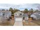 This two-story home includes a well-maintained yard, two-car garage, and beautiful landscaping at 4485 E Andover Ave, Castle Rock, CO 80104