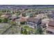 Aerial view of a lovely home featuring a backyard deck and complemented by its neighborhood setting at 16184 Gold Creek Dr, Monument, CO 80132