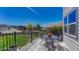 Outdoor deck seating offers serene views and a great space for entertaining or relaxing outside at 16184 Gold Creek Dr, Monument, CO 80132