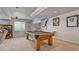 Recreational basement area with pool table and barstools at 16184 Gold Creek Dr, Monument, CO 80132