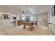 Finished basement with a pool table, a dart board and bar seating at 16184 Gold Creek Dr, Monument, CO 80132