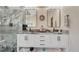 Stylish bathroom with double sinks, modern fixtures, and ample storage at 16184 Gold Creek Dr, Monument, CO 80132