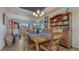 Elegant dining room with tray ceiling, a wooden table and decor at 16184 Gold Creek Dr, Monument, CO 80132