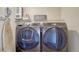 Efficient laundry area with front loading washer and dryer at 16184 Gold Creek Dr, Monument, CO 80132