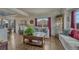 Cozy living room with hardwood floors, comfortable seating, and stylish decor at 16184 Gold Creek Dr, Monument, CO 80132