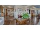 Open-concept living room showcasing hardwood floors and natural light at 16184 Gold Creek Dr, Monument, CO 80132