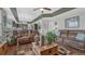 Inviting living room showcasing leather furniture, hardwood floors, and a spacious layout at 16184 Gold Creek Dr, Monument, CO 80132
