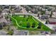 Beautiful green community park with mature trees and walking paths, enhancing the neighborhood's charm at 16184 Gold Creek Dr, Monument, CO 80132