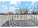 Spacious deck with white railings and string lights at 9044 W 63Rd Ave, Arvada, CO 80004