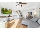 Spacious living room with hardwood floors and fireplace at 9044 W 63Rd Ave, Arvada, CO 80004