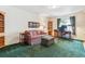 Cozy home office with a comfortable sofa and workspace by the window, offering a bright work environment at 335 Josephine St # D, Denver, CO 80206