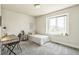 Cozy bedroom with a comfortable bed, study desk, and natural light at 1842 Peak Prairie Ln, Monument, CO 80132