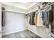 Walk in closet with carpeted floor, shelving, and hanging storage at 1842 Peak Prairie Ln, Monument, CO 80132