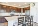 Modern kitchen with stainless steel appliances, spacious countertops, and ample storage space at 1842 Peak Prairie Ln, Monument, CO 80132
