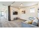 Cozy living room with soft gray sofa and decor at 1842 Peak Prairie Ln, Monument, CO 80132