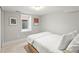 Small bedroom featuring a twin bed, neutral decor, and a window providing natural light, creating a cozy retreat at 4250 Wyandot St, Denver, CO 80211