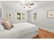 Bedroom with hardwood floors, natural light, and neutral-toned walls at 4250 Wyandot St, Denver, CO 80211