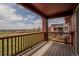 This wooden balcony features a wood railing, and a view at 2552 W 82Nd Ln # C, Westminster, CO 80031