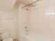 A traditional bathroom with a white tub and toilet at 2552 W 82Nd Ln # C, Westminster, CO 80031