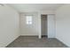 This bedroom has neutral walls, carpeted floors, one window, and a closet at 2552 W 82Nd Ln # C, Westminster, CO 80031