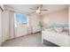 Bedroom featuring neutral carpet, lots of natural light, and a fun mural at 1121 Acadia Cir, Erie, CO 80516