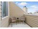 Cozy outdoor balcony with seating, perfect for relaxing and enjoying the view at 2658 S Xanadu Way # B, Aurora, CO 80014