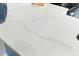 Close-up of white quartz kitchen countertop highlighting its elegant veining and ample surface at 2658 S Xanadu Way # B, Aurora, CO 80014