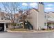 Exterior of a multi-story building with a stairway leading to the upper units at 2658 S Xanadu Way # B, Aurora, CO 80014