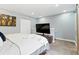 Bedroom offering a TV and ample closet space at 2658 S Xanadu Way # B, Aurora, CO 80014
