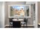Light-filled breakfast nook features a large window offering a neighborhood view at 2658 S Xanadu Way # B, Aurora, CO 80014