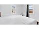 Bright bedroom featuring two windows that provide natural light at 544 S 3Rd Ave, Brighton, CO 80601